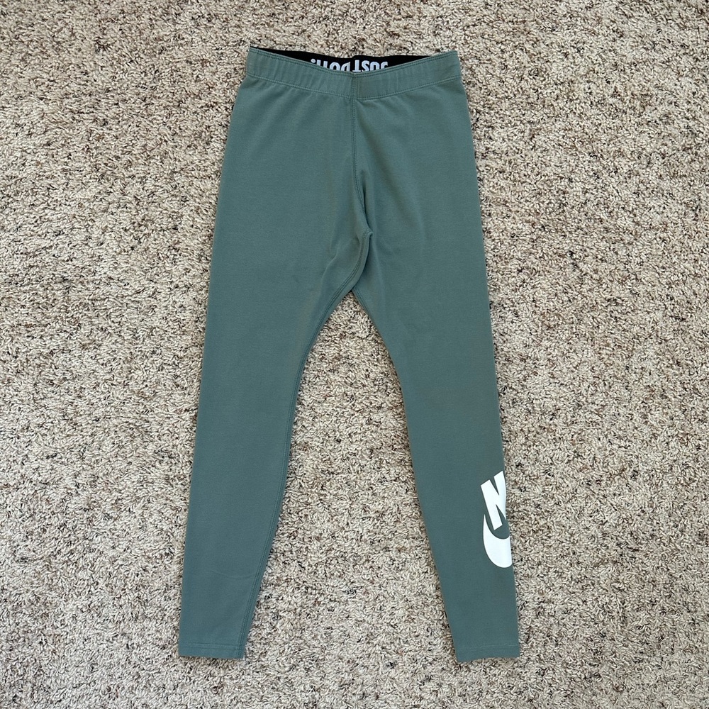 Nike green leggings with logo in white
